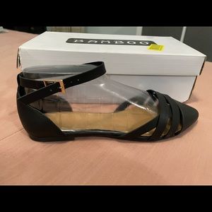 Brand new, never worn black flat sandals